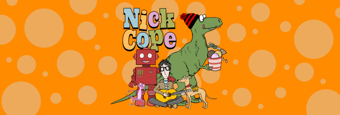 Nick Cope portrayed as a cartoon playing a guitar surrounded by a robot, a dinosaur and a dog